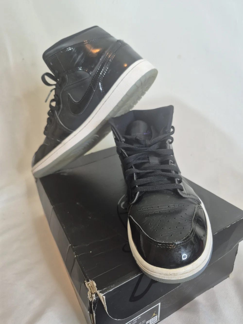 Air Jordan 1 Mid  Sneakers with White Midsole and Subtle Purple Accent